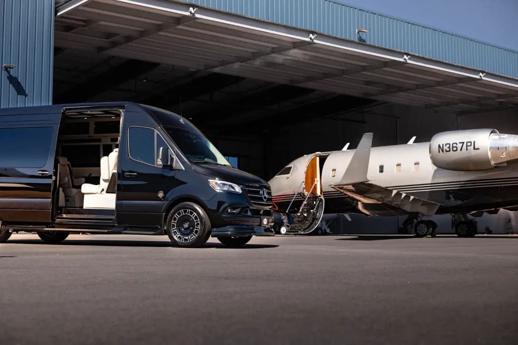 SprintVIP Mercedes Sprinter parked at private aviation hangar
